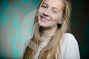 Portrait of a young blonde beautiful girl