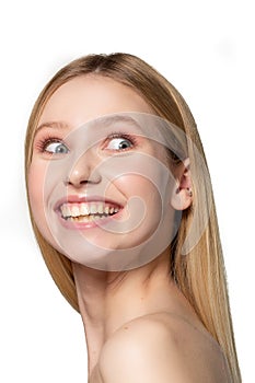 Portrait of young blonde female model that making funny face, isolated over white background