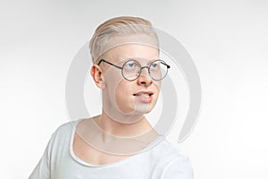 Portrait of young blonde man with healthy clean skin. on white