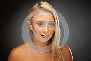Portrait of young blonde woman with gentile make-up photo