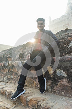 Portrait of a young boy in bright sunlight