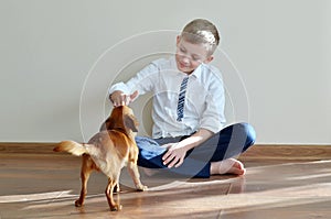 Portrait of a young boy with his dog