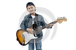 Portrait of young boy playing electric guitar, isolated on white. Boy playing the guitar