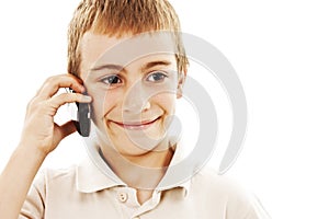 Portrait of a young boy speaking on cellphone