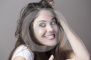 Portrait of a young brunette woman making faces