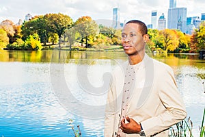 Young African American Man traveling in Central Park, New York