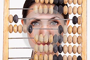 Portrait of young business woman with abacus