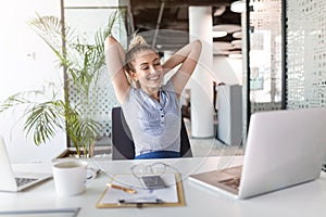 Portrait of a young business woman in an office