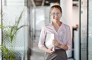 Portrait of a young business woman in an office