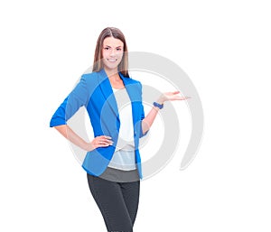 Portrait of young business woman pointing on white background