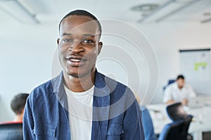 portrait of young businessman employee in startup office