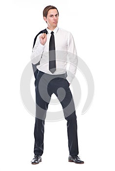 Portrait of a young businessman holding black suit jacket