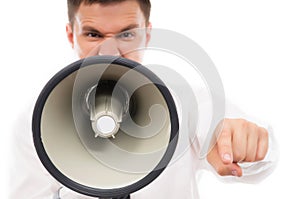 Portrait of a young businessman with a megaphone