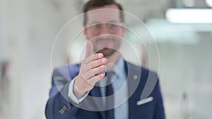 Portrait of Young Businessman offering Hand Shake