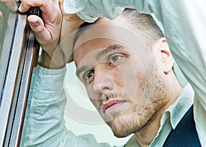 Portrait of young businessman in stress