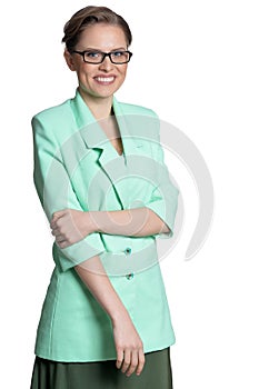 Portrait of young businesswoman in glasses on white background