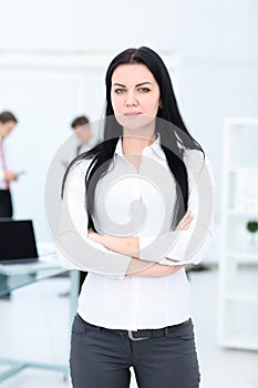 Portrait of a young businesswoman in modern office