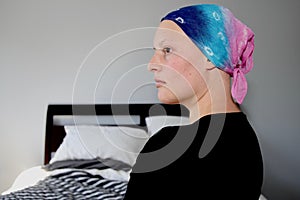 Portrait of a young cancer patient looking to side