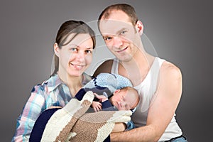 Portrait of a young caucasian couple with three