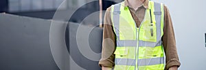 Portrait young caucasian man is architect planning and inspector project and scheme at construction site.