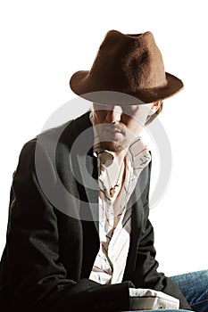 Portrait of a young Caucasian man in hat