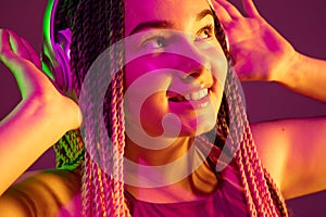 Portrait of young caucasian woman on pink background with copyspace, unusual and freaky appearance