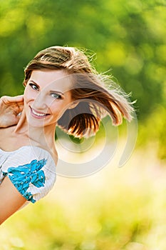 Portrait young cheerful woman peeps