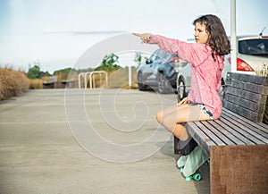 portrait of young child or teen girl roller skating outdoors, firness, wellbeing, active healthy lifestyle