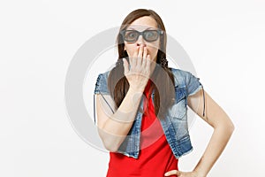 Portrait of young concerned beautiful woman in 3d imax glasses and casual clothes watching movie, film and covering face