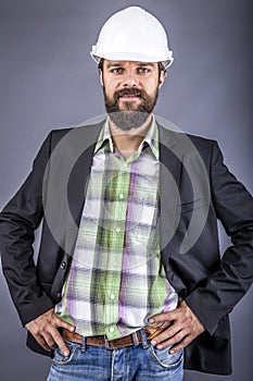 Portrait of a young confident engineer with helmet