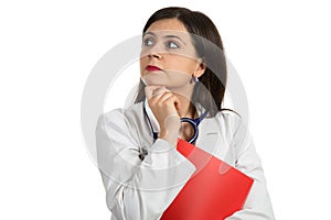 Portrait of young confident female doctor holding folder