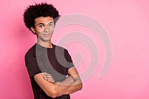 Portrait of young confident man seems like boss crossed arms smiling good mood leader it corporation isolated on pink