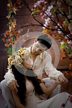 Portrait of young couple in antique dress