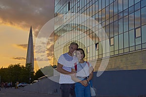 Portrait of a young couple students tourists traveling