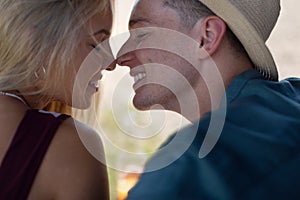 Portrait of young couple in summer, bonding.