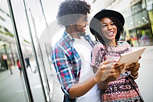 Portrait of a young couple travelling and having fun