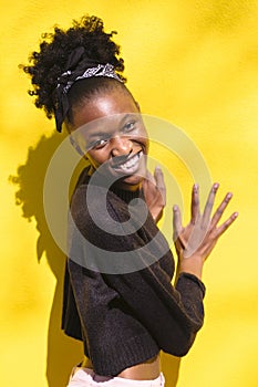 Portrait of young curly-hair african smiling girl