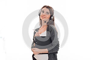 Portrait of young cute call center worker girl with headphones and microphone isolated on white background