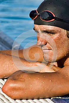 Portrait of young determined swimmer
