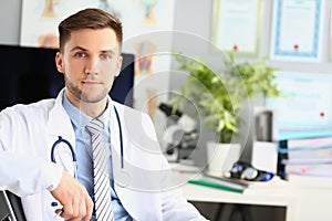 Portrait of young doctor therapist cardiologist in clinic