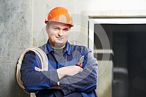 Portrait of young Electrician in uniform