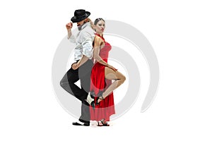 Portrait of young elegance tango dancers. Isolated over white background