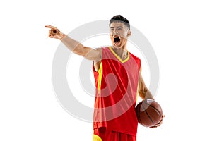 Portrait of young emotive man, basketball player schouting and pointing isolated over white studio background. Team