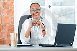 Portrait of young female doctor in clinic photo