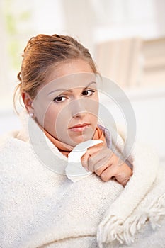 Portrait of young female having flu feeling bad