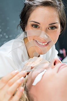 portrait young female professional cosmetologist