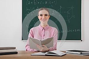 Portrait of young female teacher