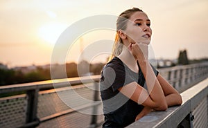 Portrait of young fit attractive happy fitness woman in city. People healthy lifestyle concept.