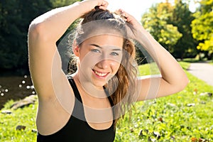 Portrait of young fit woman outdoors