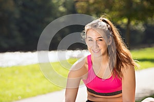 Portrait of young fit woman outdoors